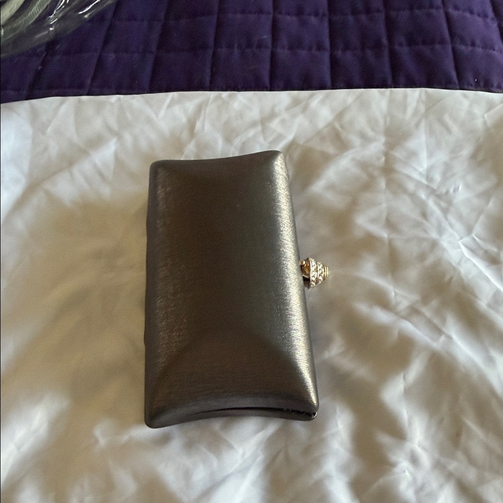 Chic Metallic Clutch by [Brand]